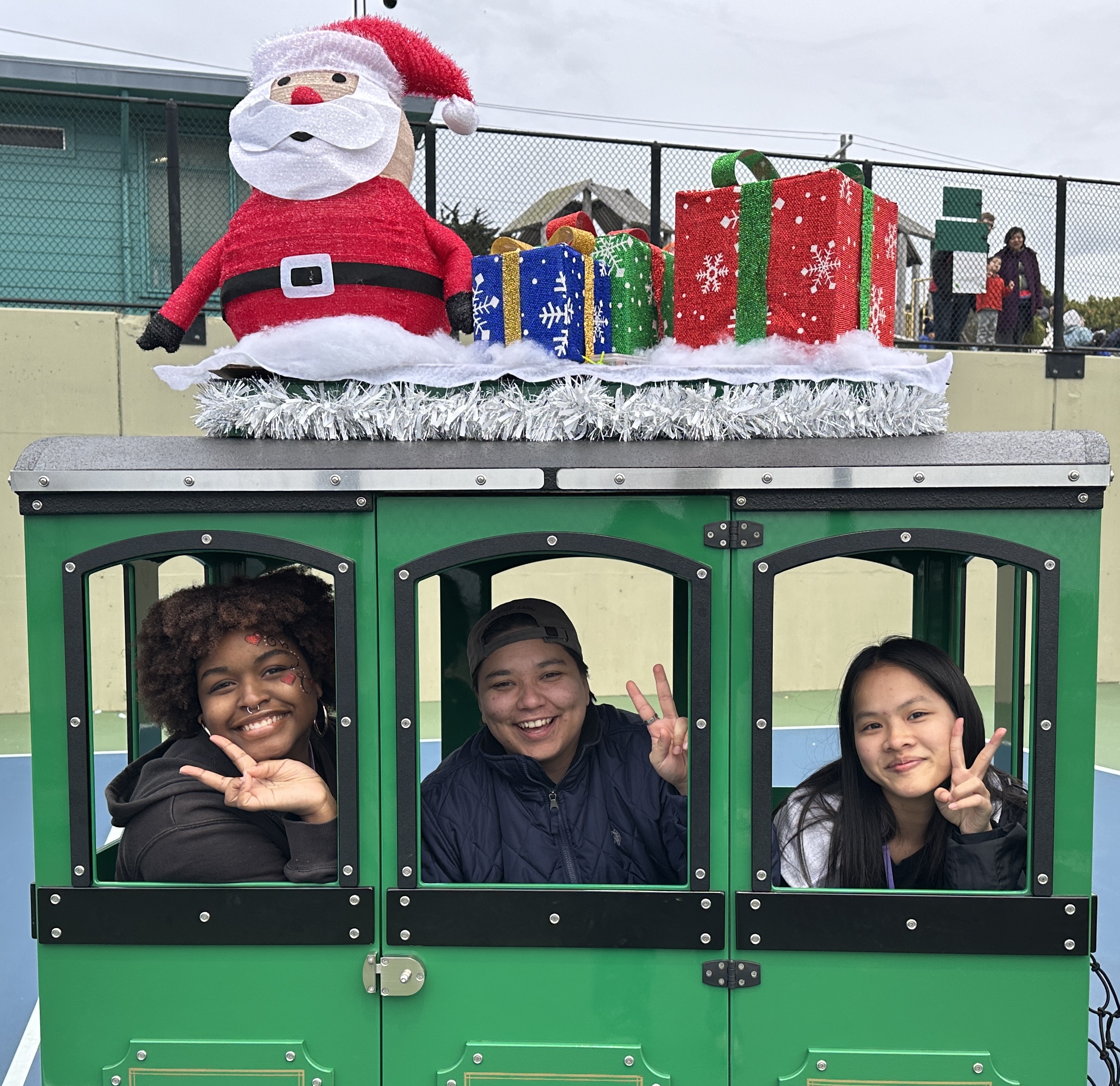 2024 Toy Drive CCE interns in train