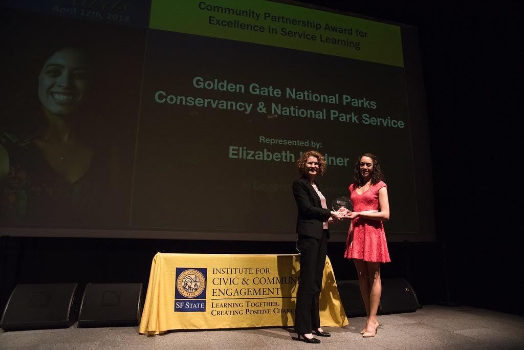 Elizabeth Linder receiving award