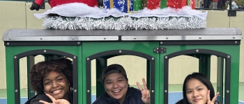 2024 Toy Drive CCE interns in train